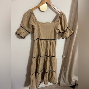 Tropiko Tan Flutter Sleeve Dress with Black Accents